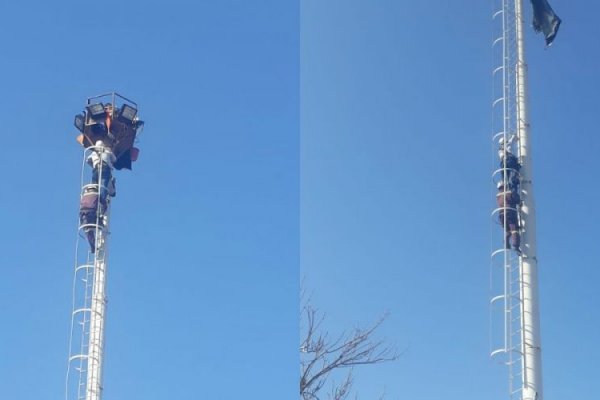 Mujer embarazada y un hombre protestan desde una torre del Hospital Perrando